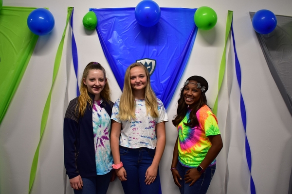 Students dressed up in tie dye apparel.