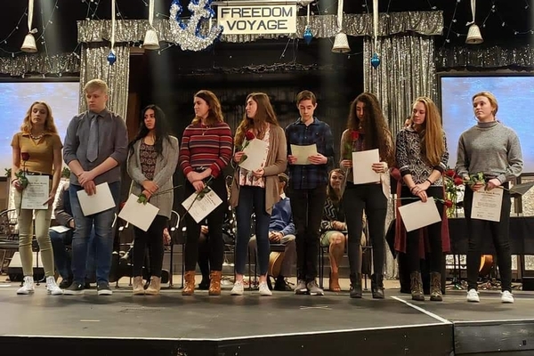 Students standing to receive awards.